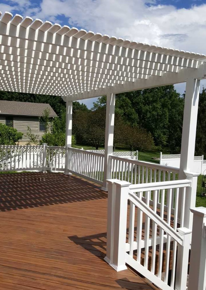 brown deck with white railing